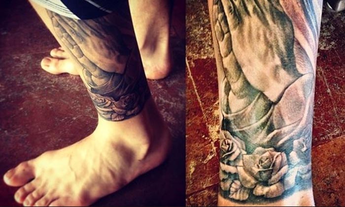 Tatuaje de Justin Bieber - Manos rezando