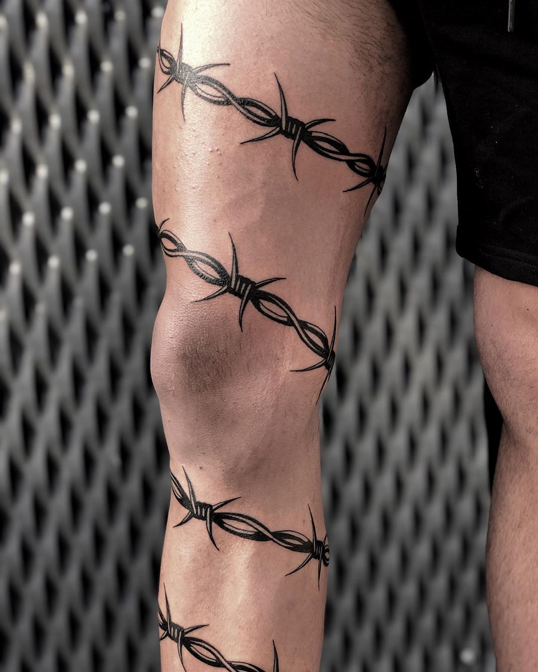 Tatuajes de vallas con púas: Diseños audaces para expresar tu estilo único